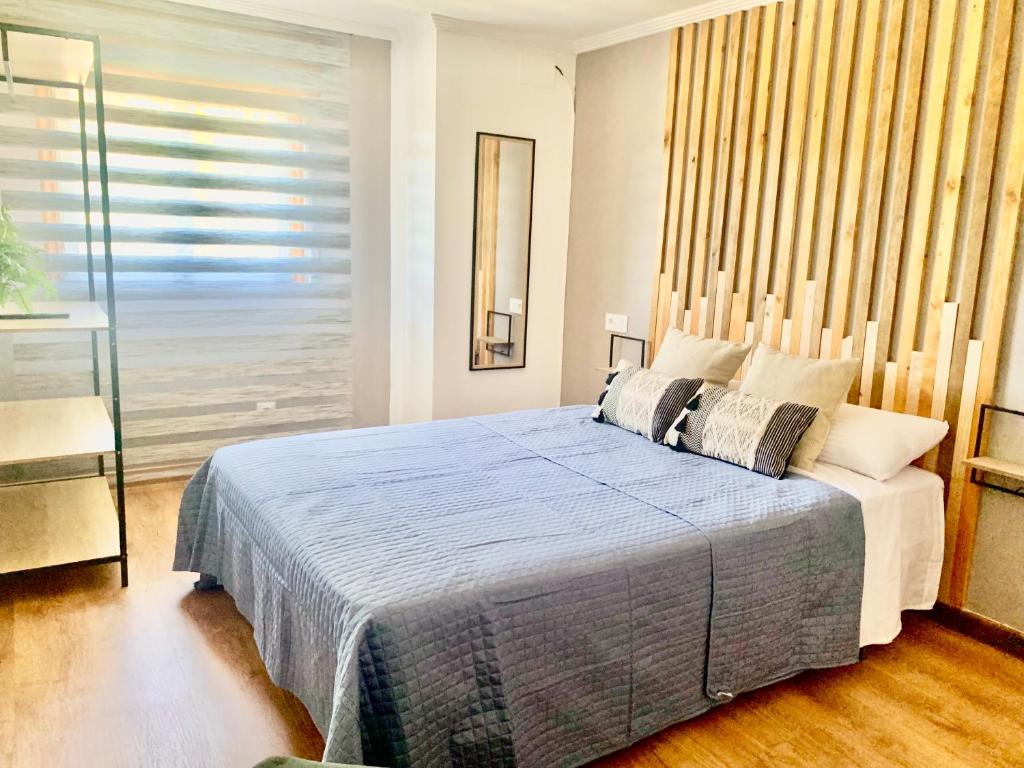 Posteľ alebo postele v izbe v ubytovaní Blue House - Feel The Vibe