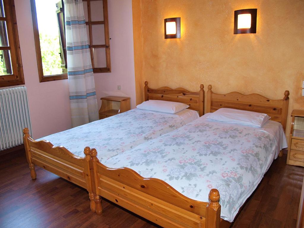 Postel nebo postele na pokoji v ubytování Olga Studios
