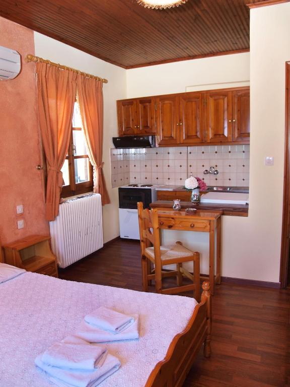 Kuchyň nebo kuchyňský kout v ubytování Olga Studios