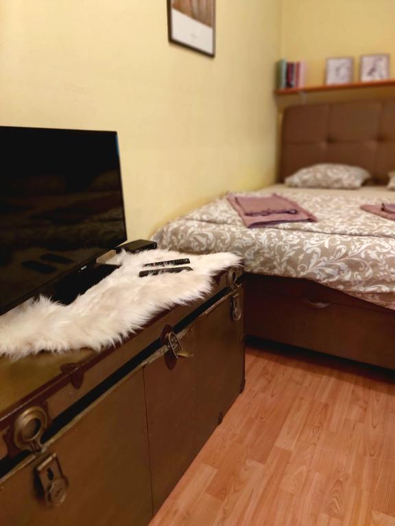 Posteľ alebo postele v izbe v ubytovaní Apartman Nikos
