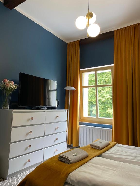 Postel nebo postele na pokoji v ubytování CIENISTA 7 APARTMENTS