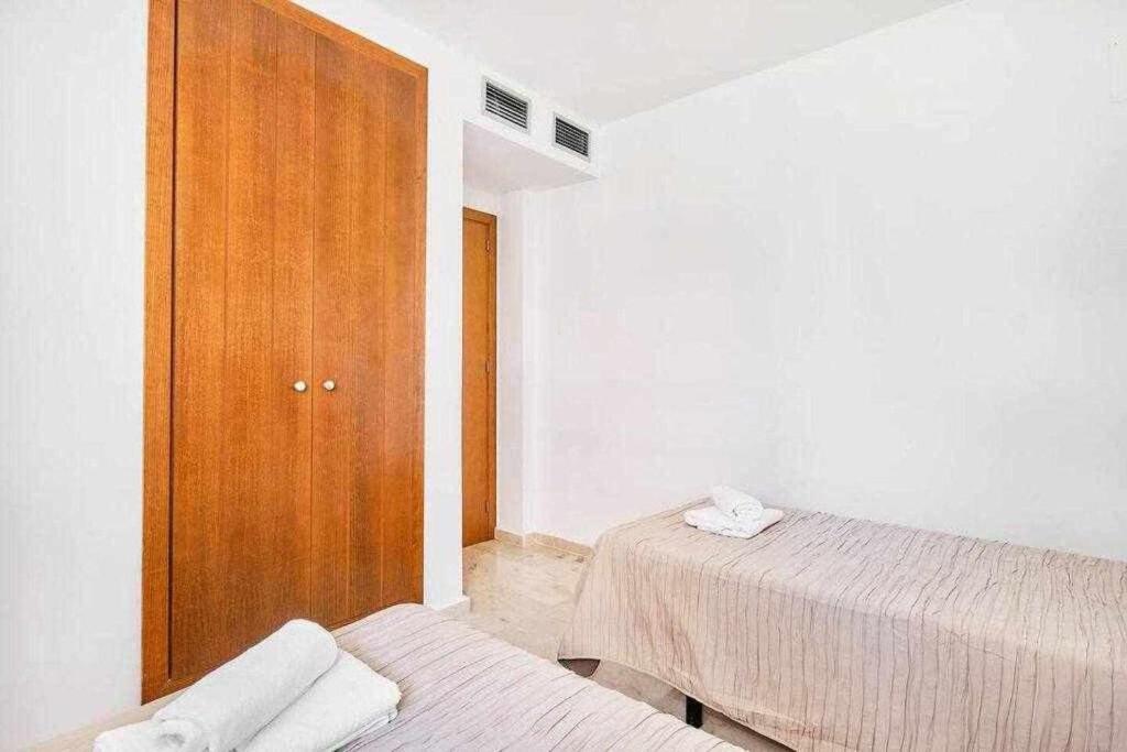 Postel nebo postele na pokoji v ubytování Espanhouse Linda apartment