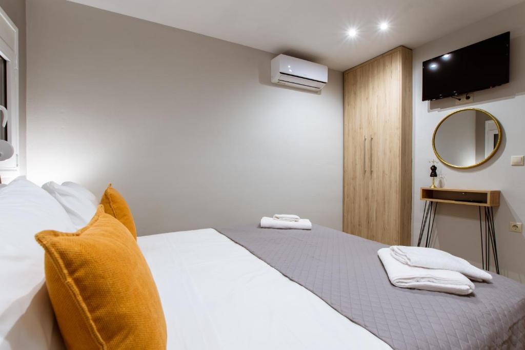 Postel nebo postele na pokoji v ubytování Kares Dream House