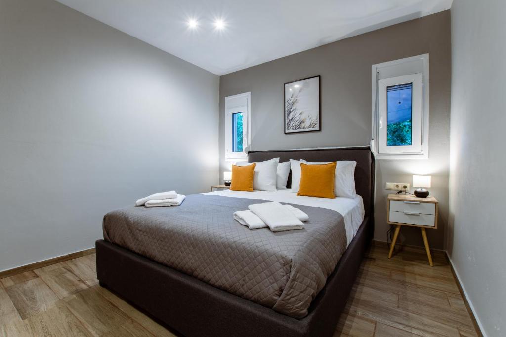 Postel nebo postele na pokoji v ubytování Kares Dream House