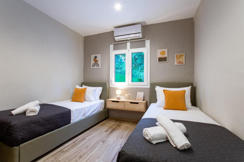 Postel nebo postele na pokoji v ubytování Kares Dream House
