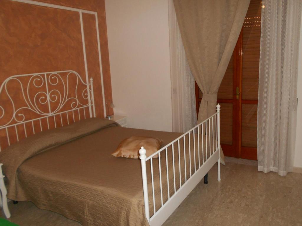 Postel nebo postele na pokoji v ubytování Appartamento mare e monti Two