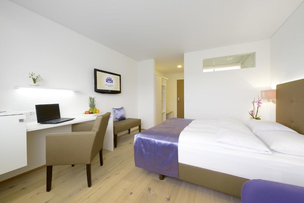 Postel nebo postele na pokoji v ubytování Hotel Al Ponte