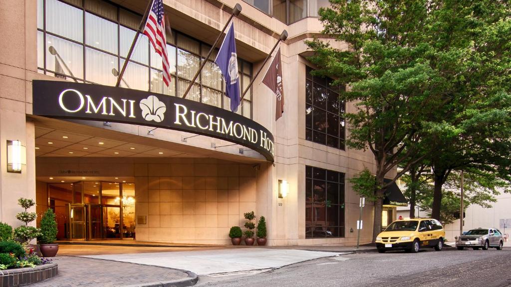 a building with an omni network sign on it at Omni Richmond Hotel in Richmond