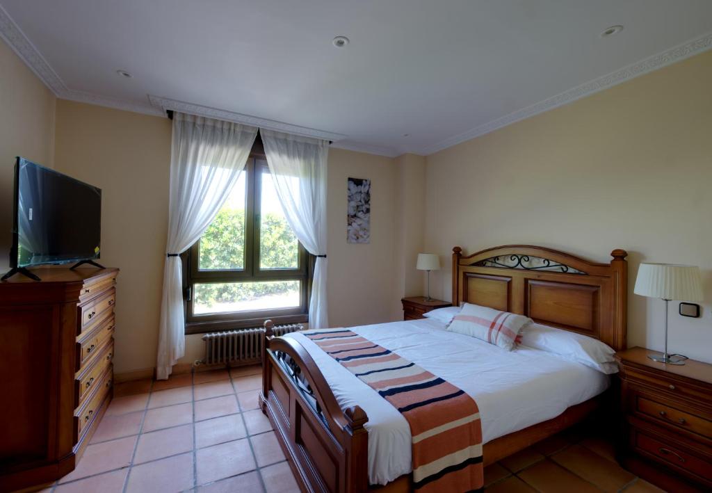 Postel nebo postele na pokoji v ubytování La Casona de la Playa
