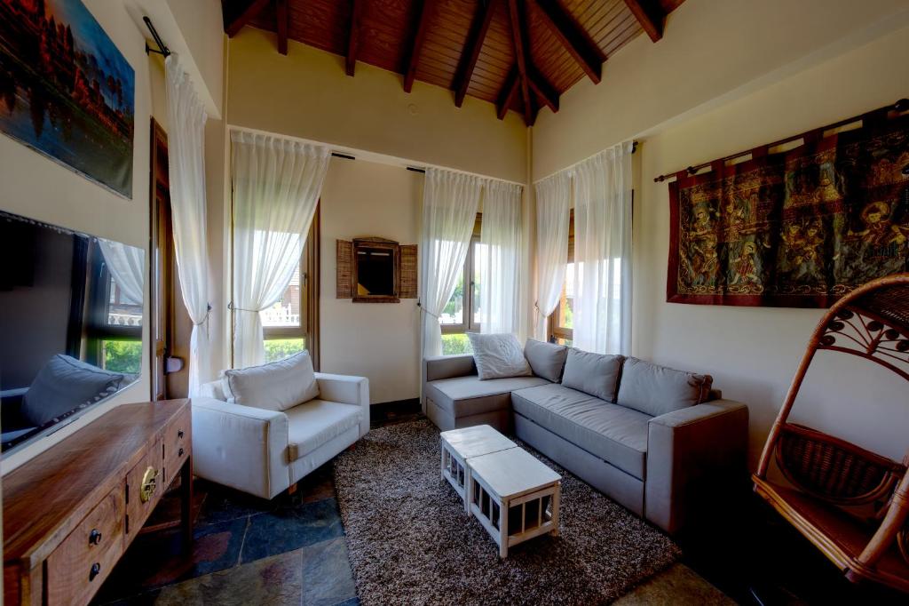 TV a/nebo společenská místnost v ubytování La Casona de la Playa