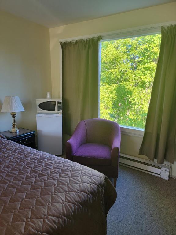 Postel nebo postele na pokoji v ubytování Gateway Motel