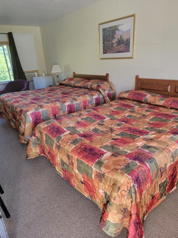 Postel nebo postele na pokoji v ubytování Gateway Motel