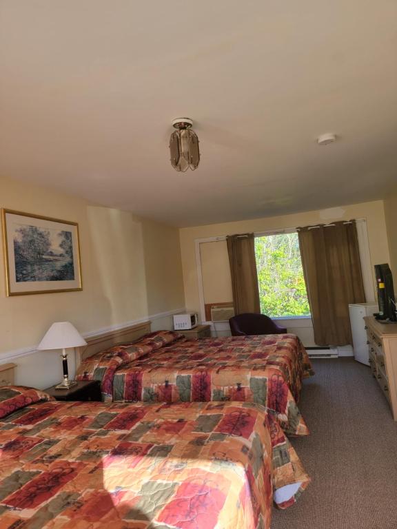 Postel nebo postele na pokoji v ubytování Gateway Motel