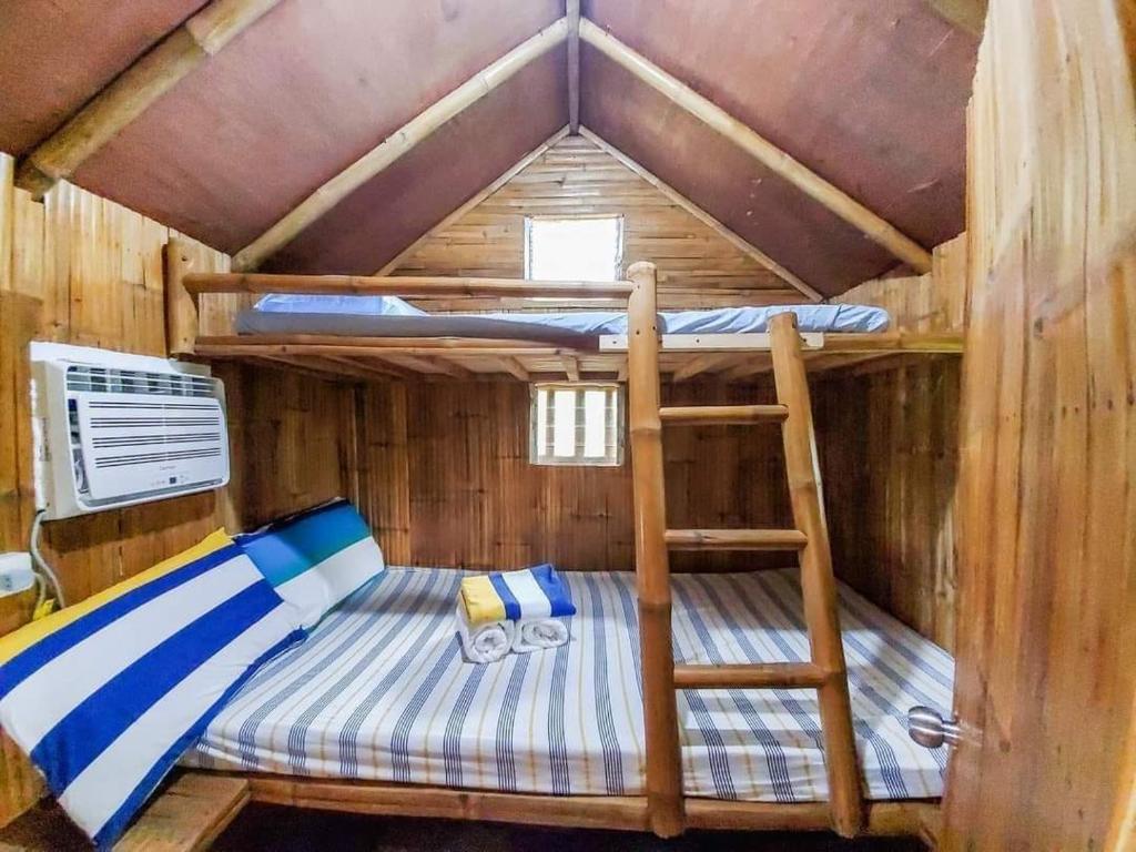 Postel nebo postele na pokoji v ubytování Youhan Beach Resort