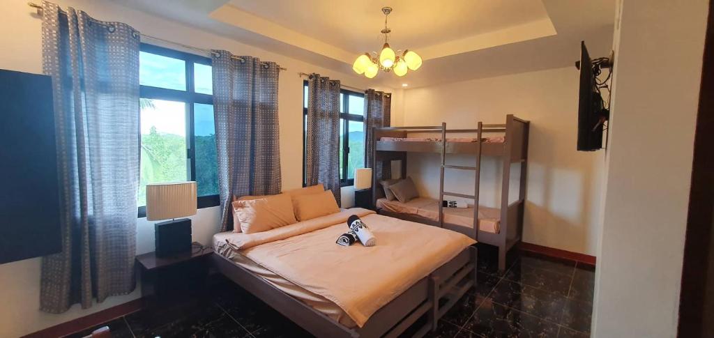 Postel nebo postele na pokoji v ubytování West Atlantic Inn