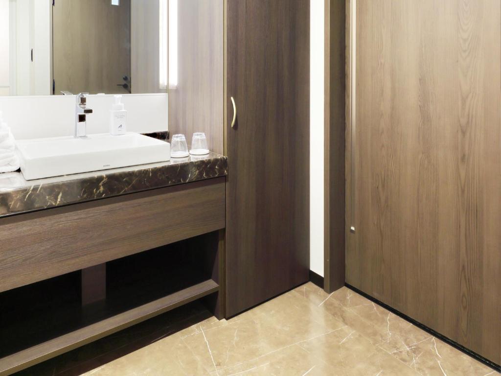 Koupelna v ubytování Hotel SUI Kobe Sannomiya by ABEST
