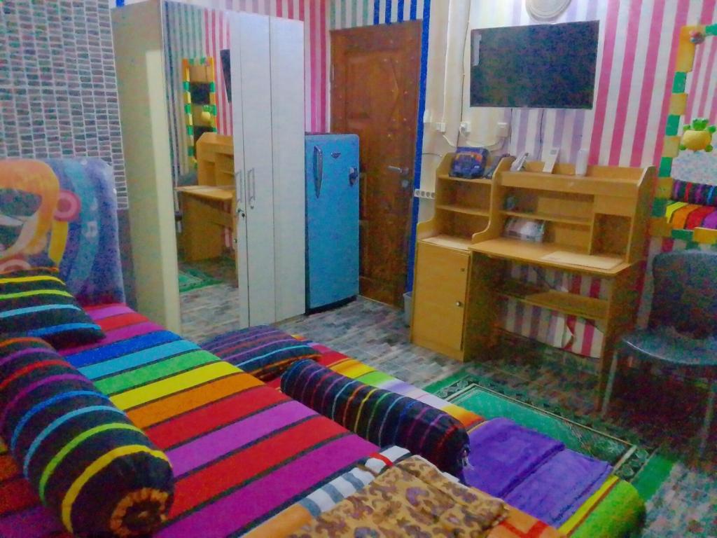 TV a/nebo společenská místnost v ubytování Pelemkecut Double-Degree Syariah Accommodation