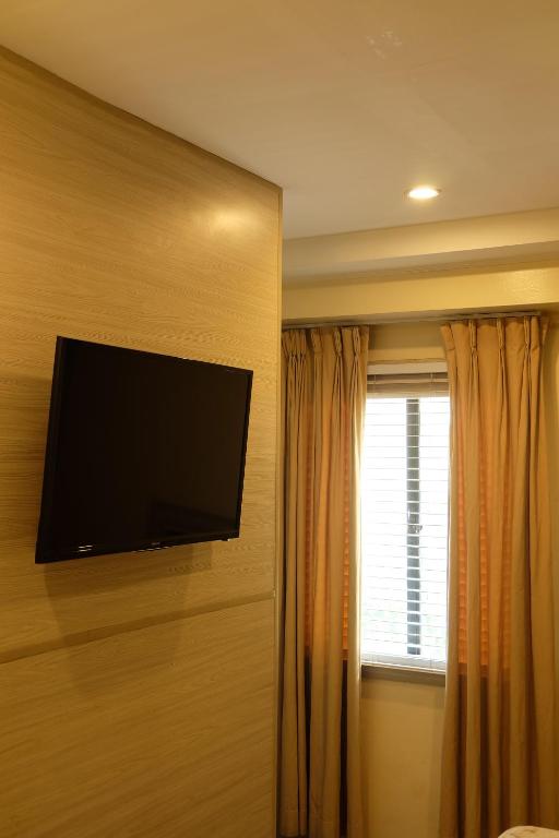 TV a/nebo společenská místnost v ubytování Spaces Hotel Makati