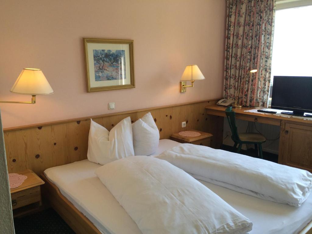 Postel nebo postele na pokoji v ubytování Hotel Daneu