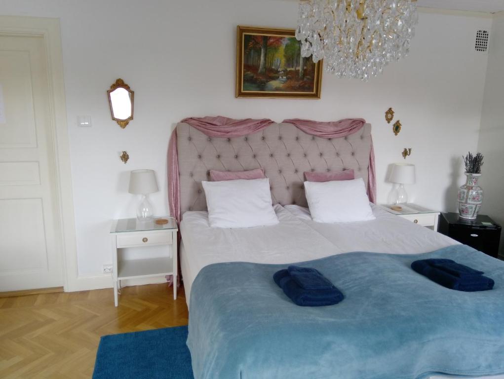 Postel nebo postele na pokoji v ubytování B&B Lilla Lotten