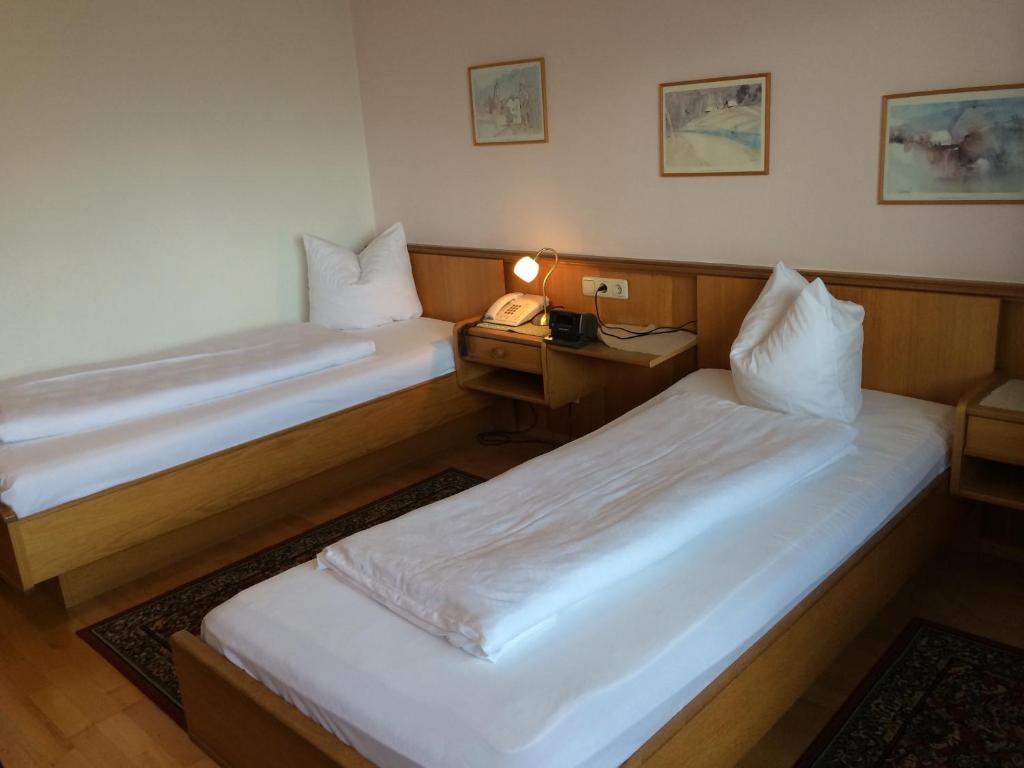 Postel nebo postele na pokoji v ubytování Hotel Daneu
