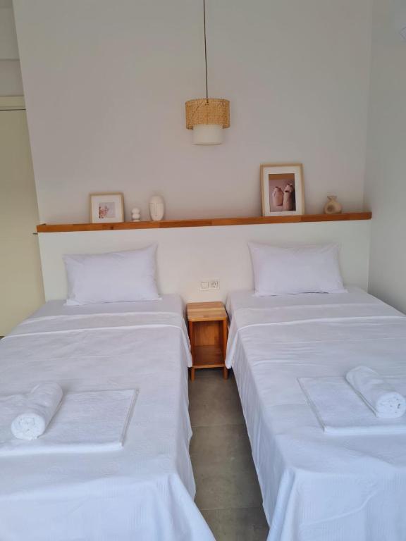 A bed or beds in a room at Ozilvillas