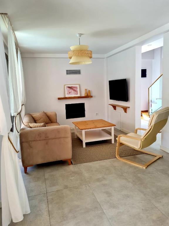 A television and/or entertainment centre at Ozilvillas