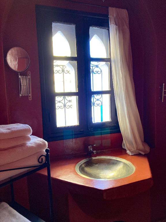 Uma cama ou camas num quarto em Dar Hannan