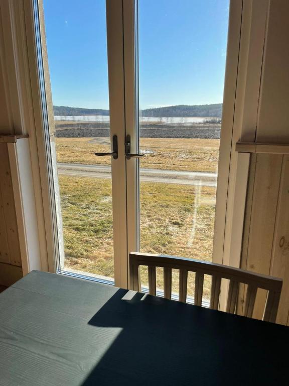 Postel nebo postele na pokoji v ubytování Älvstalodges