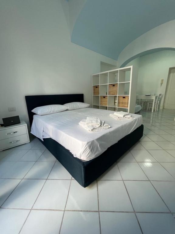 Posteľ alebo postele v izbe v ubytovaní Blue B&B Ischia