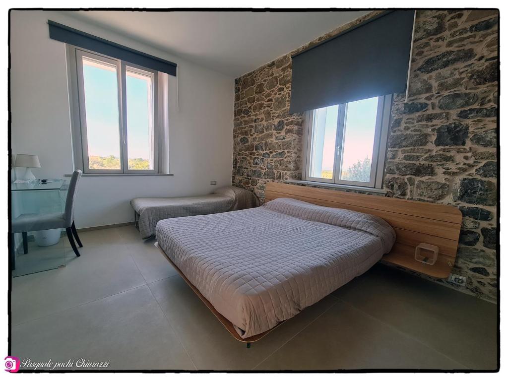 Postel nebo postele na pokoji v ubytování Alta Area