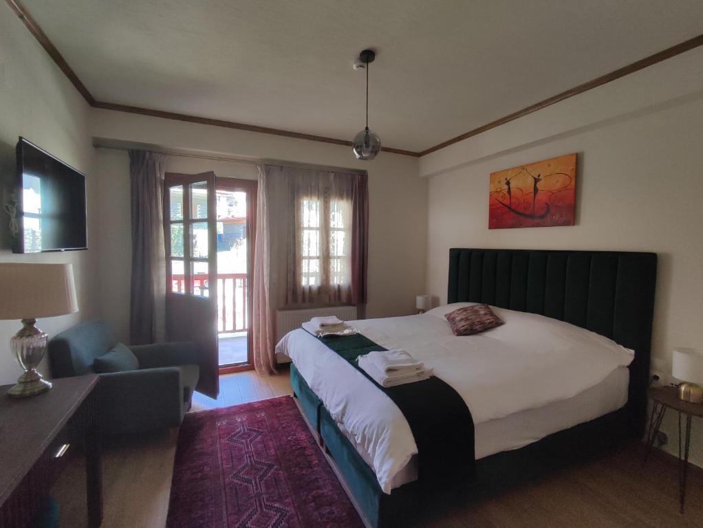 Postel nebo postele na pokoji v ubytování NUCA GUESTHOUSE