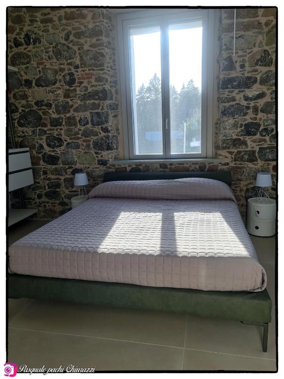 Postel nebo postele na pokoji v ubytování Alta Area