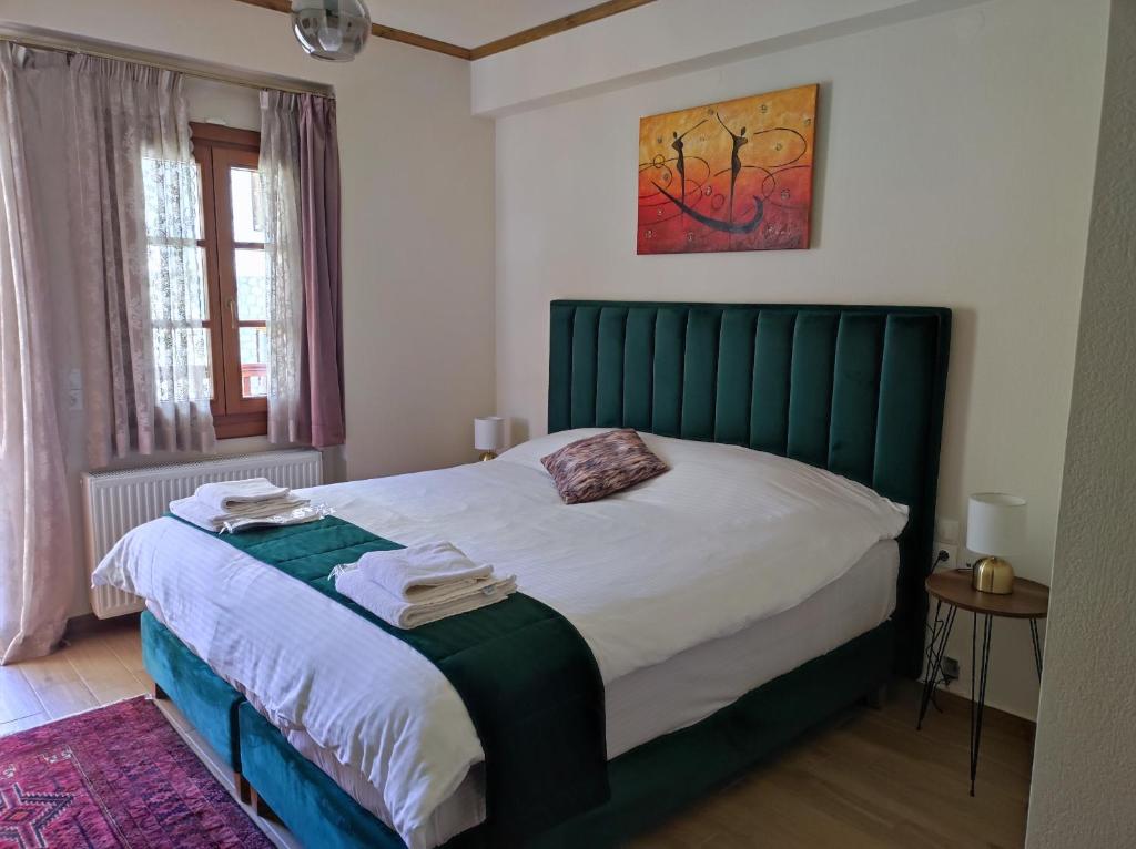 Postel nebo postele na pokoji v ubytování NUCA GUESTHOUSE