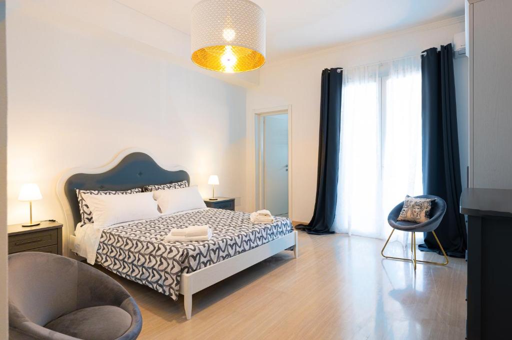 Postel nebo postele na pokoji v ubytování Katamera Guest House