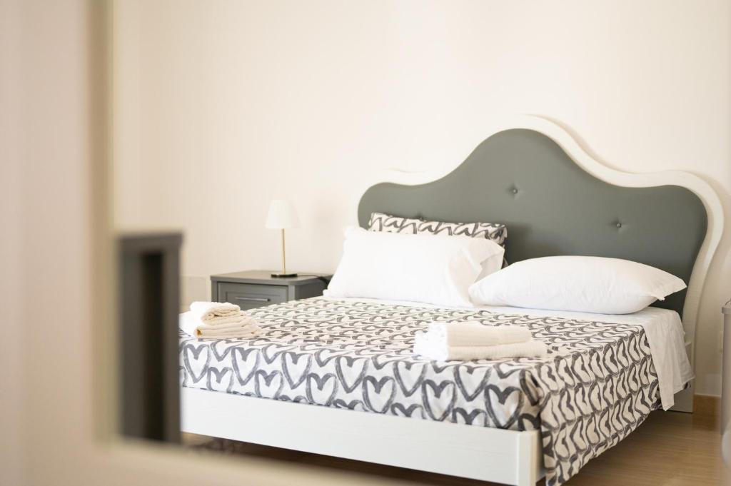 Postel nebo postele na pokoji v ubytování Katamera Guest House