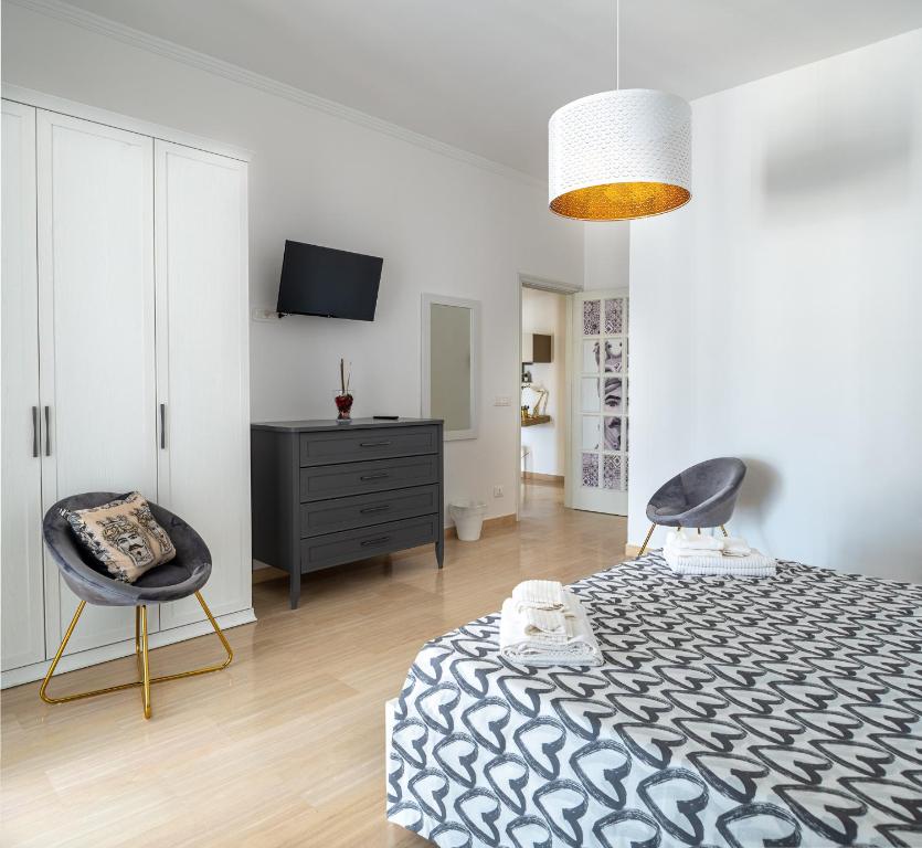 Postel nebo postele na pokoji v ubytování Katamera Guest House