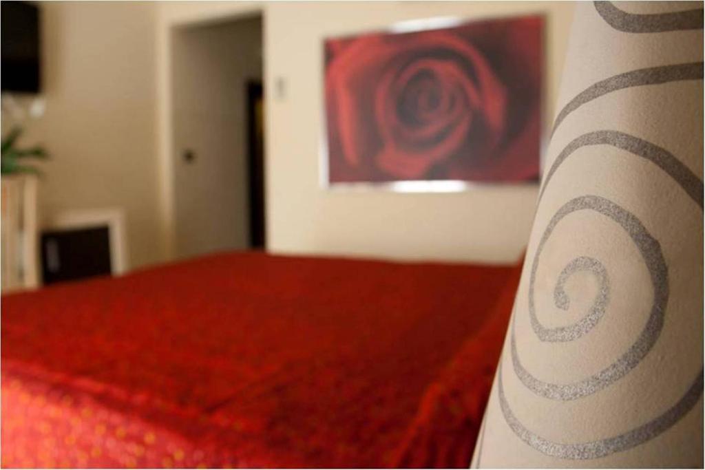 A bed or beds in a room at Hotel Gabbiano