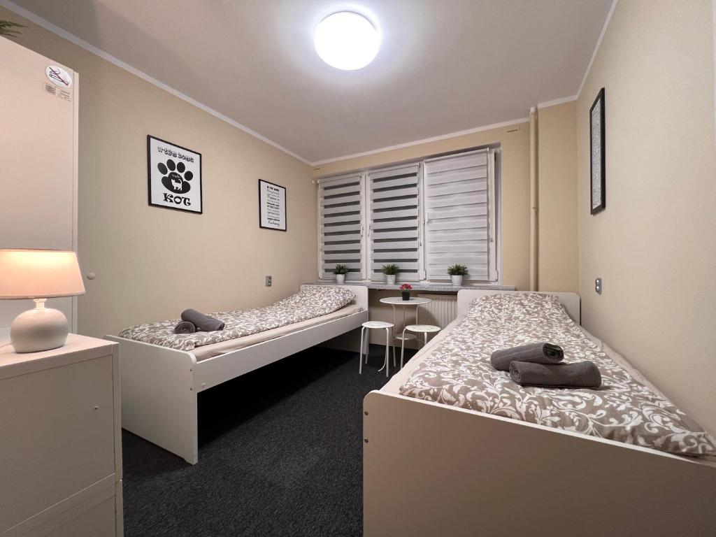 Posteľ alebo postele v izbe v ubytovaní Apart Rooms City Centre