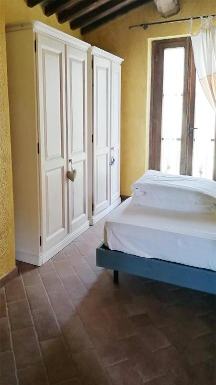 Posteľ alebo postele v izbe v ubytovaní Agriturismo Monte Gusciani