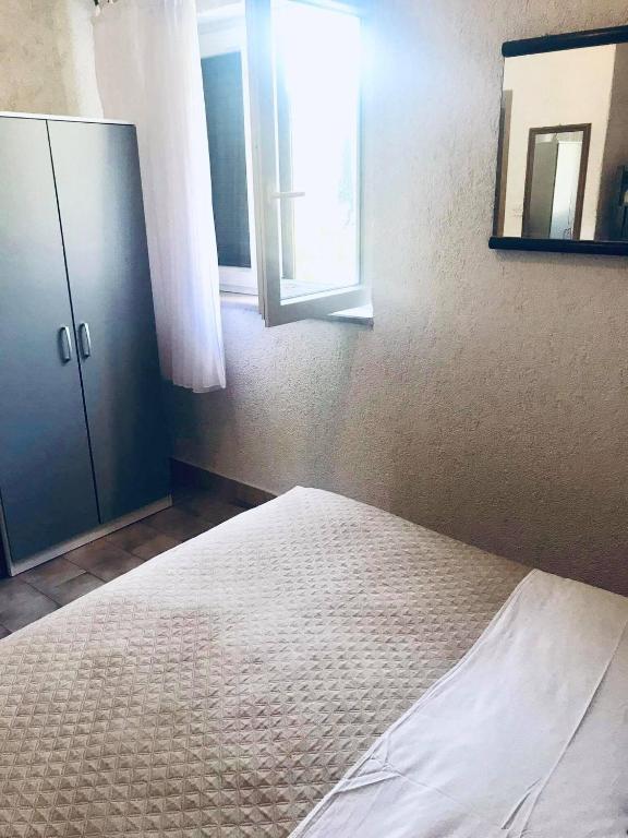 Postel nebo postele na pokoji v ubytování Apartman More