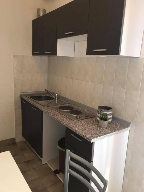 Kuchyň nebo kuchyňský kout v ubytování Apartman More