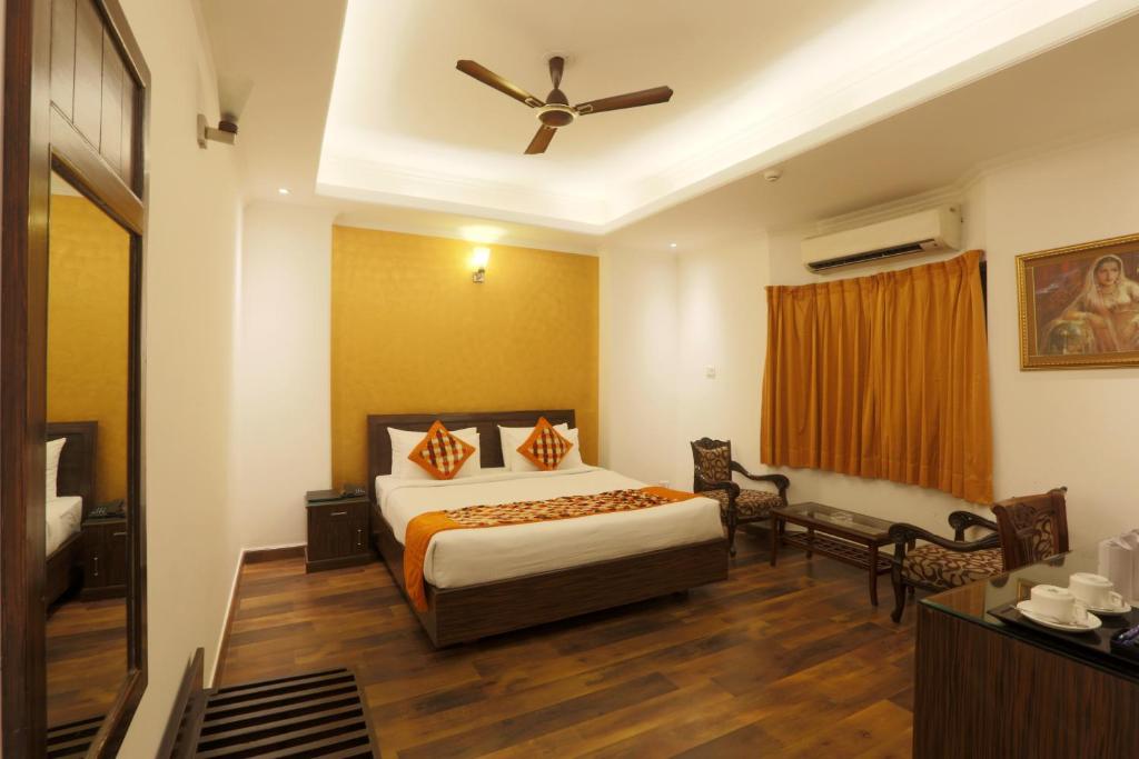 Postel nebo postele na pokoji v ubytování Airport Hotel Le Seasons New Delhi
