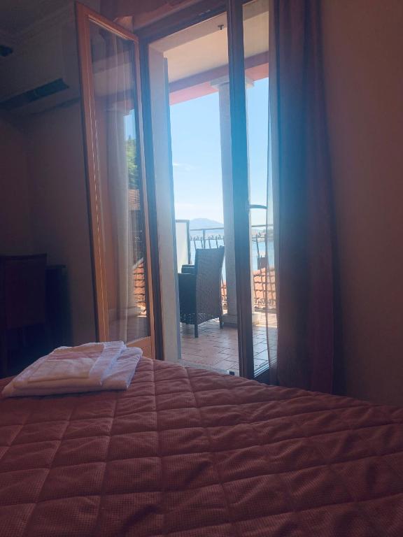 Postel nebo postele na pokoji v ubytování Hotel Romagna