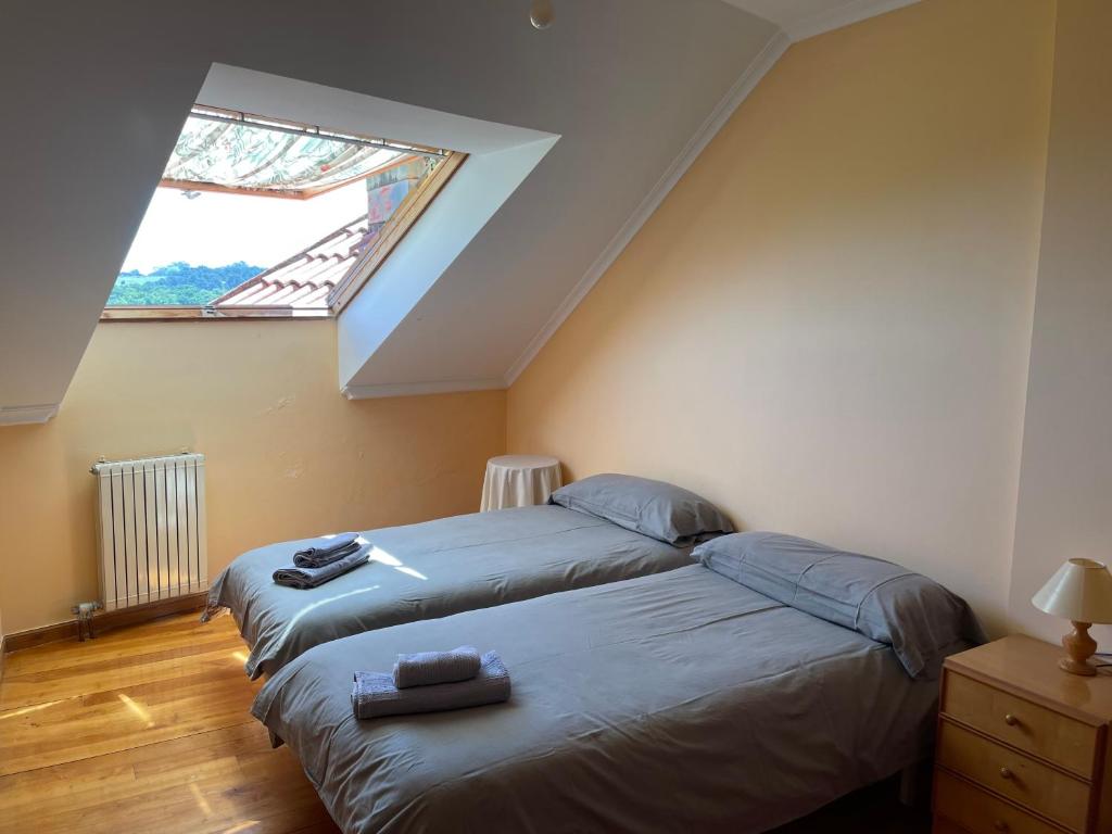 Postel nebo postele na pokoji v ubytování Ermita (2) San Vicente de la Barquera duplex