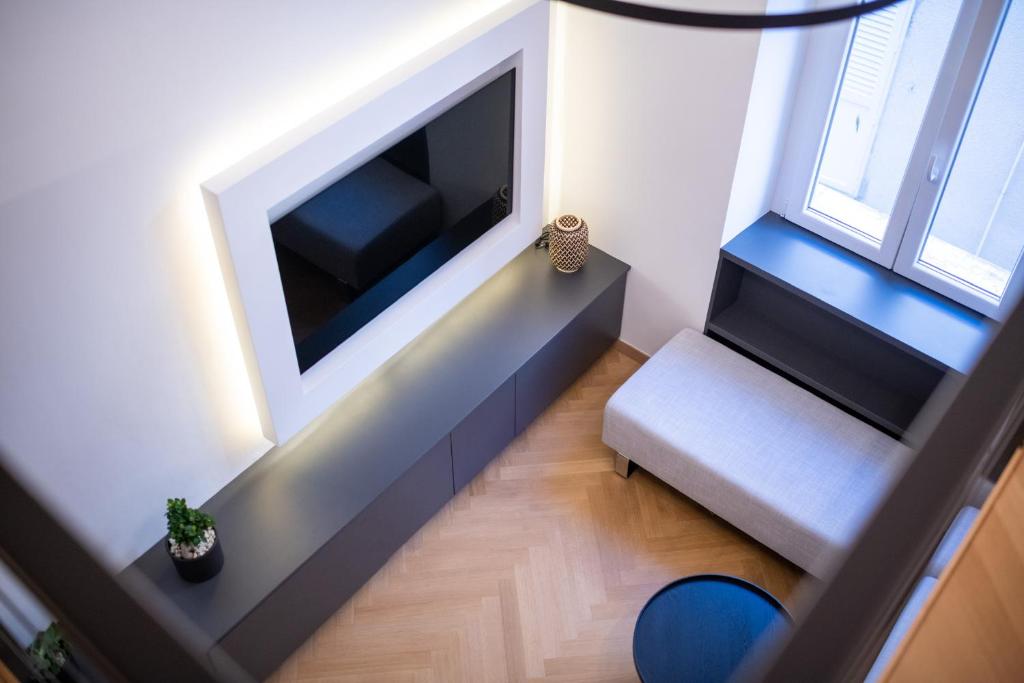 Televízia a/alebo spoločenská miestnosť v ubytovaní M&M studio Zadar