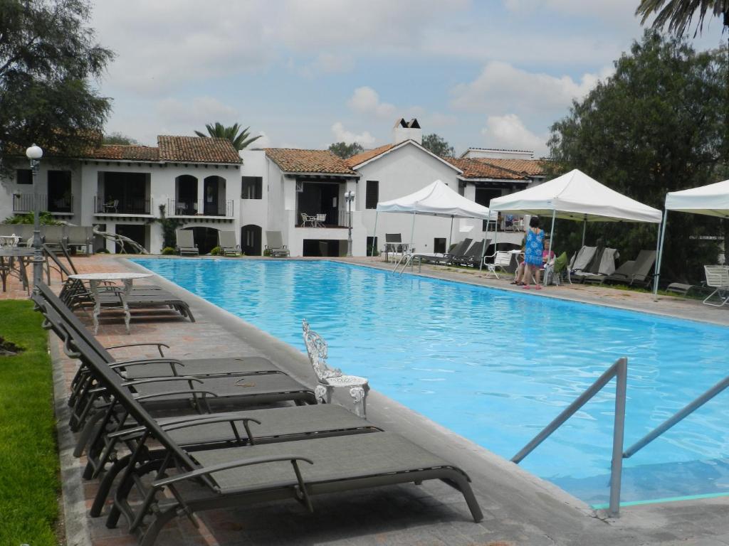 Bazén v ubytování Hotel Hacienda Taboada (Aguas Termales) nebo v jeho okolí