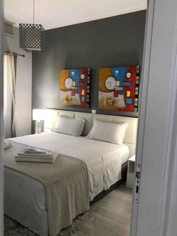 Posteľ alebo postele v izbe v ubytovaní Urban Residence