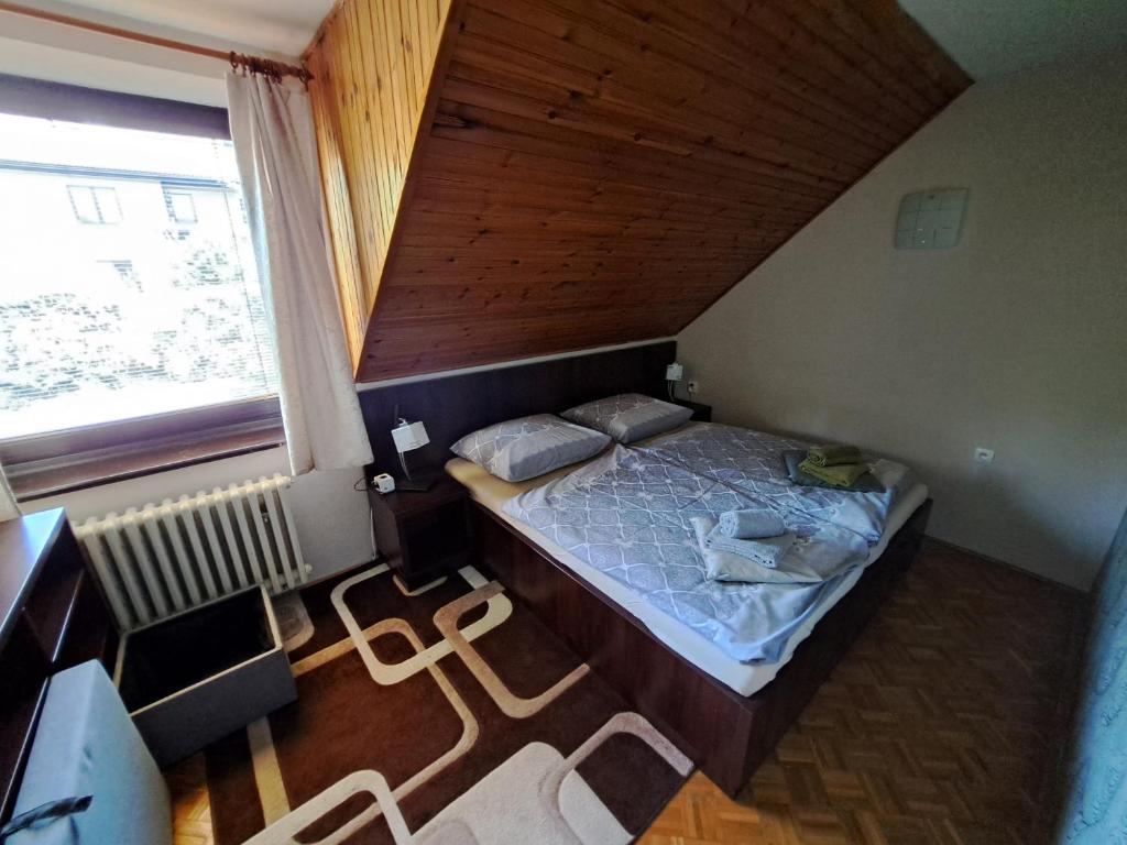 Postel nebo postele na pokoji v ubytování Villa in High Tatras Residence VDV