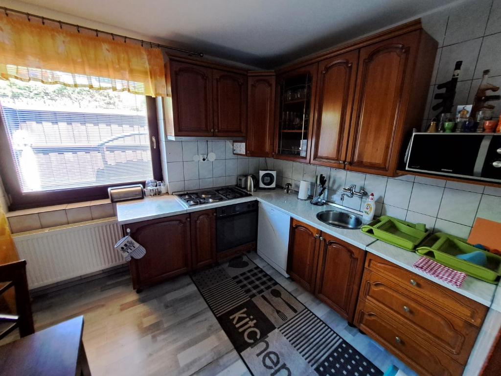 Kuchyň nebo kuchyňský kout v ubytování Villa in High Tatras Residence VDV